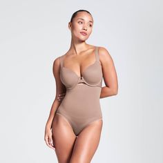 Talk about results! This lightweight brief uses targeted zones to tone your tummy and give you a perky rear view. The high waist offers added tummy control and eliminates muffin top without digging in, while the seamless design provides all-day comfort and support that won't show through (bye, visible panty lines!). High Waist Supportive Shapewear, Bra Friendly, Sculpting Push-up Bra-friendly Shapewear, High Waist Bra Friendly Shapewear, Muffin Top, Rear View, Briefs, Talk About, High Waist, High Waisted