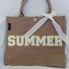 a brown bag with the word summer on it