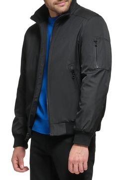 Every closet craves this edgy bomber styled with handy side pockets, a water-resistant finish and comfy ribbed trim. Front zip closure Stand collar Front zip pockets Ribbed cuffs and hem Water resistant Lined 100% polyester Machine wash, line dry Imported Functional Fitted Outerwear With Ribbed Cuffs, Nylon Outerwear With Pockets For Urban Adventures, Black Nylon Outerwear With Zipper Closure, Casual Black Track Jacket With Zip Cuffs, Sporty Nylon Outerwear With Zipper, Casual Black Outerwear With Zip Cuffs, Casual Outerwear With Zipper Closure For Urban Adventures, Casual Outerwear With Zipper For Urban Adventures, Casual Track Jacket With Zip Cuffs For Work