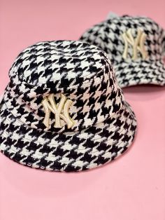 Be prepared to stand out when you wear this dad hat. This houndstooth design with the NY logo is what you are missing in your closet. Trendy Brimmed Baseball Cap With Letter Print, Trendy Brimmed Hat With Embroidered Logo, Trendy Dad Hat With Letter Print And Short Brim, Trendy Streetwear Bucket Hat With Letter Print, Trendy Letter Print Bucket Hat, Trendy Bucket Hat With Embroidered Logo, Be Prepared, Dad Hat, Dad Hats