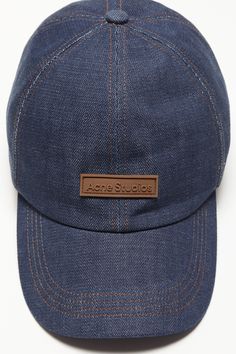 Baseball cap is crafted from denim and detailed with an Acne Studios logo patch on the front. Complete with an adjustable closure at the back. FN-UX-HATS000208 Trucker Style Baseball Cap With Logo Patch, Trucker Baseball Cap With Logo Patch, Trucker-style Six-panel Baseball Cap With Logo Patch, Adjustable Denim Hat With Embroidered Logo, Casual Baseball Cap With Leather Patch, Denim Snapback Baseball Cap For Streetwear, Denim Blue Baseball Cap, Denim Hat With Curved Bill, Adjustable Denim Hat With Curved Visor