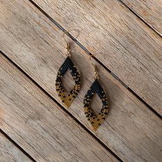 Pair of earrings hand-woven by me with Miyuki beads (Japanese glass beads) and a stainless steel frame. The gold colored beads are 24 karat gold. Miyuki Beads, Stainless Steel Frame, Steel Frame, Hand Woven, Favorite Jewelry, Jewelry Earrings Dangle, Gold Color, Etsy Earrings, Glass Beads