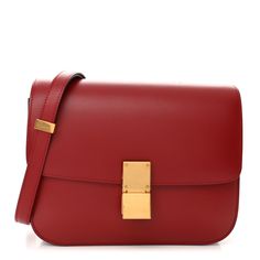 This is an authentic CELINE Smooth Calfskin Medium Classic Box Flap in Red.  This chic shoulder bag is crafted of luxuriously smooth calfskin leather in a medium size in vivid red. The bag features a waist-length shoulder strap and a facing flap for the shiny gold press-lock. The flap opens to a partitioned leather interior. Formal Red Shoulder Bag With Smooth Grain, Formal Red Smooth Grain Shoulder Bag, Red Calf Leather Office Bag, Luxury Classic Red Flap Bag, Formal Red Calf Leather Shoulder Bag, Red Calf Leather Formal Shoulder Bag, Chic Red Shoulder Bag With Smooth Grain, Luxury Red Flap Bag With Top Handle, Red Luxury Leather Box Bag