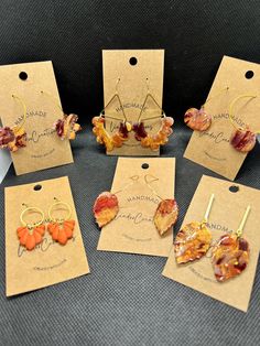 Free Shipping to US addresses Lightweight fall color clay earrings, pumpkin shaped clay with shiny resin coating On a gold coated ear wire hoop; Hoop diameter is 1.25 inches Orange, red burgundy maroon and gold clay earrings Autumn pumpkin handmade earrings unique Halloween Thanksgiving gift for her  All my earrings are handmade and slight variations in color or texture may occur Orange Small Hoop Jewelry Gift, Orange Small Hoop Jewelry For Gifts, Orange Small Hoop Jewelry As Gift, Orange Small Hoop Earrings For Gift, Small Hoop Earrings Orange Gift, Gold Polymer Clay Jewelry For Crafting, Small Hoop Earrings Orange For Gift, Small Hoop Earrings In Orange For Gifts, Orange Hoop Earrings With Ear Wire For Gift