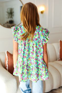 Make a statement with this mint floral print tiered ruffle top with a back clasp keyhole. Designed with flutter sleeves and merrow stitching, this charming top is simply divine. Back Keyhole Clasp + Ruffle Tiers + Flutter Sleeves Woven - No Stretch 100% POLYESTER Designed in California Imported Runs True to Size Weight: .375 Lbs; Plus .438 Lbs Bust (side seam to side seam): S 20" M 21" L 22" 1X 24" 2X 25" 3X 26" Length (shoulder to hem): S 29" M 29.5" L 30" 1X 31" 2X 31.5" 3X 32" Regular Model M Denim Blouse, Flutter Sleeve Top, Top Graphic Tees, Ruffle Top, Flutter Sleeves, Dress Romper, Small Bust, Dresses With Leggings, Hat Hairstyles