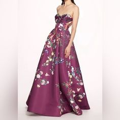 Marchesa Notte Paradise Ball Gown New With All Tags Retail $1295 Color: Amethyst Size: 14 Bust- 41” Waist- 34.5” Hi Hip (4” Down From Waist)- 40.5” Low Hip (8” Down From Waist)- 44” Gown Skirt Length- 47” 100% Polyester Satin Dry Clean Only Style Id: N68g3463 The Paradise Ball Gown Is Crafted With Custom Paradise Printed Heavy Duchess Satin. The Strapless A-Line Gown Features Detailed Embroidery Along A Sweetheart Bustline And Is Finished With Pockets At The Waist. A-line Dress With Floral Print For Banquet, Elegant Purple Ball Gown For Gala, Purple Gown With Sweetheart Neckline For Banquet, Purple Floor-length Ball Gown For Gala, Elegant Purple A-line Gown, Purple A-line Banquet Dress, Purple A-line Dress For Banquet, Purple A-line Wedding Gown, Silk Dress With Sweep Train For Banquet