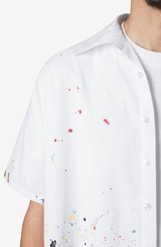 Colorful splatters bring a fresh-from-your-masterpiece look to this button-up cut for an easy, layer-ready fit from crisp, cool cotton poplin. Front button closure Spread collar Short sleeves Chest button-patch pocket 100% cotton Machine wash, dry flat Imported Casual Paint Splatter Tops Relaxed Fit, Casual Paint Splatter Tops For Summer, Casual Relaxed Fit Tops With Paint Splatter, Cotton Paint Splatter Tops For Streetwear, Casual Short Sleeve Paint Splatter Top, Casual Spring Tops With Paint Splatter, Casual Short Sleeve Tops With Paint Splatter, Spring Short Sleeve Tops With Paint Splatter, Casual Paint Splatter Top For Spring