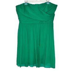 This Beautiful Green J.Crew Dress Is Perfect For Any Special Occasion. The Strapless Design With A Sweetheart Neckline And Zip Closure Creates A Flattering And Classic Look. The Dress Is Made Of 100% Silk Chiffon, Which Gives It A Lightweight And Airy Feel, Perfect For Summer And Spring. The Dress Has A Short Length And An Empire Waist Style, Plus It Comes In A Plus Size 20. It Is Lined And Has No Vintage Elements. The Dress Is Perfect For Weddings Or Cocktail Parties, And Its Solid Pattern And Plus Size 20, J Crew Women, Vintage Elements, J Crew Dress, Cocktail Parties, Solid Pattern, A Plus, Dress Plus Size, Silk Chiffon