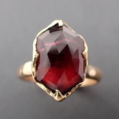 I created this setting in wax then cast it in recycled solid 18k Yellow gold at my home studio. This ring is a size 7 it can be resized up or down. The stone is a Rubellite tourmaline. it measures about 13mm X 9.5mm I created a rustic texture in the gold. The band is around 3mm. Throughout all time and history, in every tribe and culture all around the world crystals, minerals and gemstones have used for healing, luck, divination, adornment vibrational medicine and so much more. Hand Forged Red Ruby Ring, Hand Forged Ruby Ring In Red, Vibrational Medicine, Red Tourmaline, Rustic Texture, Rubellite Tourmaline, Minerals And Gemstones, Yellow Gold Ring, Ring Gemstone