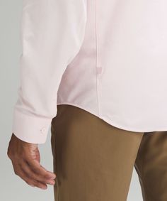 A modern take on a classic style. Fabric is sweat-wicking, quick-drying, anti-stink, and designed for all-day comfort. Designed for Casual. Designed with room in the chest and at the waist. Underarm gusset for greater mobility. Eyelets for ventilation. More wearing, less washing. This garment was treated with our No-Stink Zinc technology to inhibit the growth of odour-causing bacteria on the fabric. Fitted Lululemon Tops, Fitted Long Sleeve Shirt For Everyday, Fitted Tops With Button Cuffs For Everyday, Fitted Top With Button Cuffs For Everyday, Casual Pink Dress Shirt For Work, Lululemon Relaxed Fit Cotton Top, Fitted Long Sleeve Dress Shirt For Everyday, Pink Collared Casual Dress Shirt, Casual Pink Collared Dress Shirt