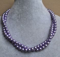 I make the necklace to use 8mm light purple glass pearls.The necklace total length can be select.It will is shorter when it be twist,IT is good necklace for your great wedding. I can make different type necklace to your requirements,Please feel free to contact me if you have any question. Thank you so much. . matching stud earrings: https://www.etsy.com/listing/187689224/lilac-pearl-earringsglass-pearl . mathing dangle earrings: https://www.etsy.com/listing/154883661/lilac-pearl-earringswedding? Luxury Purple Elegant Pearl Necklace, Purple Jewelry Set, Fake Pearl Necklace, Purple Wedding Jewelry, Big Pearl Necklace, Hell Lila, Purple Flower Necklace, Large Pearl Necklace, Floating Pearl Necklace