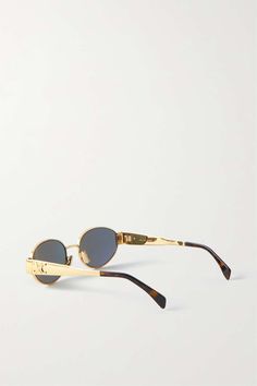 CELINE EYEWEAR Oval-frame gold-tone and tortoiseshell acetate sunglasses | NET-A-PORTER Gold Oval Sunglasses With Mirrored Lenses, Luxury Oval Sunglasses With Tinted Lenses, Formal Gold Oval Sunglasses, Gold Oval Sunglasses For Formal Occasions, Luxury Oval Sunglasses With Mirrored Lenses, Luxury Oval Sunglasses With Gradient Lenses, Celine Eyewear, Beauty Calendar, Green Lenses