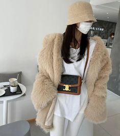 Casual Fluffy Fur Coat For Cold Weather, Casual Fluffy Fur Coat For Fall, Cozy Fluffy Fur Coat For Fall, Winter White Outerwear With Faux Fur Lining, Trendy Long Fur Coat With Faux Fur Lining, Trendy Long Coat With Faux Fur Lining, Cozy Fluffy Winter Outerwear, Winter White Fluffy Long Sleeve Outerwear, Winter White Long Fur Coat With Faux Fur Trim