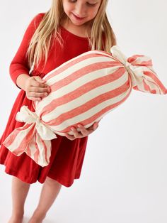 "This Peppermint Candy Pillow in a vintage inspired red and cream stripe is a whimsical addition to your Christmas decor.   The peppermint striped linen cover is removable and machine wash & dry friendly.  Cream linen ties with hand-pulled fringe complete the peppermint candy pillow.  A 12\" pillow form is included. Features: Cream and red striped linen sleeve with hand-pulled, fringed cream ties 12\" pillow insert INCLUDED Cover is easily removed for machine wash and drying Oeko-Tex Certified L Oversized Christmas Decorations, White Christmas Throw Pillows, Candy Pillow, Vintage Christmas Pillows, Candy Pillows, Holiday Pillows Covers, Diy Pillow Covers, Christmas Throw Pillow, Peppermint Christmas