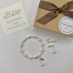 Enjoy 10% off as I celebrate 10 years on Etsy! This lovely First Communion bracelet and earrings set is sure to be the perfect gift! The beautiful bracelet also doubles as a single decade rosary. This classic bracelet has been a big seller as First Communion jewelry, Confirmation jewelry, Easter bracelet, Flower Girl gift, Maid-of-Honor jewelry, Bridesmaids matching bracelets, Mother-of-the-Bride jewelry, Godmother gift, and as Bridal jewelry. Description: -Bracelet measures 5 ½ inches plus a 1- Sterling Silver Rosary Bracelet Gift, Sterling Silver Rosary Bracelet With Round Beads As Gift, Sterling Silver Rosary Bracelet With Round Beads, Nickel-free Sterling Silver Pearl Bracelet Gift, Nickel-free Sterling Silver Pearl Bracelet, White Sterling Silver Rosary Bracelet Gift, Dainty Hypoallergenic Jewelry For First Communion, Confirmation Jewelry, Communion Gifts Girl