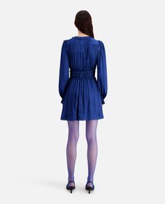 Short blue dress with shirring | The Kooples - US Elegant Puff Sleeve V-neck Dress With Ruffle Hem, Ruffled Smocked Dress For Party, Party Smocked Dress With Ruffles, Silk V-neck Pleated Dress, V-neck Pleated Puff Sleeve Dress, Fitted V-neck Pleated Dress With Ruffles, Pleated V-neck Dress With Fitted Waist, Elegant Puff Sleeve V-neck Dress With Ruffles, Elegant Puff Sleeve Dress With Ruffles And V-neck