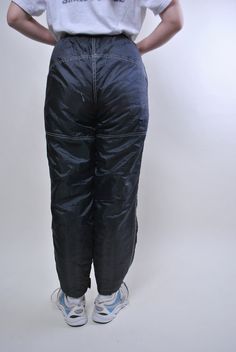 "Vintage women black skiing pants, retro snow trousers, Size M Welcome to TARASCOMMON.ETSY.COM Unique clothing from the 20th century. Model tall - 170cm Size: M. 14/164 - size on the tag. Width - 29-45cm / 11.41-17.71inch; Length - 105cm / 41.33inch. Hips - 50cm/ 19.68inch; Front rise - 31cm/ 12.2inch; All measurements are taken seam to seam while lying flat. Polyester/ Nylon; Belt. This item is vintage, so it can have some defects. Additional photos can be send We are glad that you are interest Retro Winter Streetwear Bottoms, Black Bottoms With Pockets For Ski Season, Vintage Winter Trousers, Vintage Trousers For Winter, Casual Black Pants For Ski Season, Vintage High Waist Winter Pants, Retro Winter Trousers, Black Casual Skiing Bottoms, Casual Black Skiing Bottoms