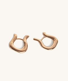 Designed to pair perfectly with our Embody Ring Keeper, our Embody Earrings are your new outfit-elevating, mood-boosting, can't-go-wrong huggies. Handcrafted in solid 925 sterling silver with an optional ultra-thick 18k gold dip. Featuring a robust closure for maximum comfort and security. Trendy Small Hoop Jewelry For Formal Occasions, Everyday Shiny Rose Gold Jewelry, Sterling Silver Huggie Jewelry With Shiny Finish, Trendy Small Hoop 14k Gold Jewelry, Sterling Silver Jewelry With Smooth Finish For Gifts, Trendy 14k Gold Small Hoop Jewelry, Luxury Everyday Huggie Hoop Earrings, Trendy Tarnish Resistant Yellow Gold Huggie Earrings, Adjustable Everyday Jewelry With Shiny Finish