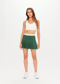 OXFORD SLOAN SKIRT in FERN | The UPSIDE Green Stretch Skort For Sports, Green Athleisure Skort For Workout, Green Athleisure Workout Skort, Casual Green Skort For Sports, Sporty Green Skort For The Gym, Casual Green Skort For Workout, Sporty Green Skort For Workout, Green Casual Tennis Skirt For Workout, Green Stretch Tennis Skirt In Athleisure Style