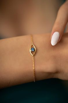 🧿 The Charm of Personalized Protection   In search of the perfect birthday gift for her or a heartfelt personalized gift for mom? Explore the allure of the Evil Eye Bracelet. This exquisitely designed bracelet, bearing an eye-shaped pendant with a mesmerizing blue stone at its heart, is more than just a piece of jewelry. It represents a shield of protection, echoing traditions that span centuries. Seamlessly blending ancient tales with modern elegance, it's the ideal pick for those who treasure sentiment and history in the accessories they adorn. 📏 Perfect Fit, Just For You   Crafted with meticulous attention to detail, this bracelet offers a comfortable length of 16 cm, with an added 3 cm extension, ensuring a total of 19 cm for a versatile and snug fit for various wrist sizes. 🚀 Swift Cheap Silver Spiritual Evil Eye Bracelet, Cheap Hypoallergenic Evil Eye Bracelet Gift, Cheap Blue Evil Eye Bracelet Gift, Evil Eye Jewelry Bracelet, Summer Jewellery, Eye Bracelets, Handmade Evil Eye, Silver Bracelets For Women, Classy Jewelry