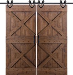 two wooden doors with metal hardware on each side and an open door at the top