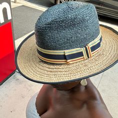 This Straw Hat Is Made From Shantung Straw And Has A Unique Teardrop Fedora Design With An Asymmetrical Brim. The Crown Measures 4" High. Blue Brimmed Sun Hat For Day Out, Blue Wide Brim Hat For Day Out, Blue Wide-brim Hat For Day Out, Blue Brimmed Hat For Day Out, Navy Visor Hat For Summer, Blue Fedora Sun Hat For Travel, Blue Fedora Hat For Travel, Blue Wide Brim Straw Hat For Travel, Casual Blue Sun Hat For Kentucky Derby