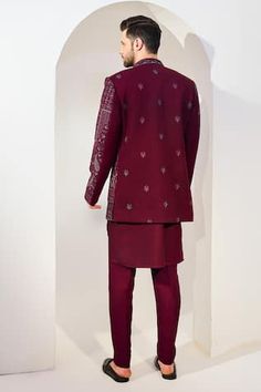 Maroon full sleeves longline bundi with all over Paisley bloom embroidery using sequin and thread highlights. Paired with a cross cut embroidered mandarin collar kurta and a pant. - Aza Fashions Long Sleeve Embroidered Nehru Jacket For Reception, Embroidered Long Sleeve Nehru Jacket For Reception, Resham Embroidered Long Sleeve Suits For Reception, Reception Suits With Resham Embroidery And Long Sleeves, Long Sleeve Suits With Resham Embroidery For Reception, Traditional Embroidered Blazer For Reception, Traditional Winter Kurta For Reception, Embroidered Nehru Jacket For Winter Reception, Long Sleeve Nehru Jacket For Diwali