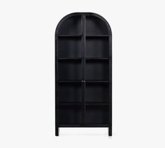 a black bookcase with an arched door