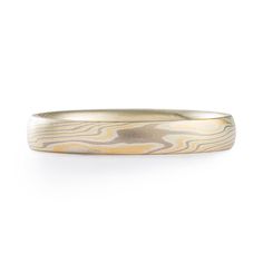 "This gorgeous custom Mokume Gane ring features our Twist Pattern and is made in our Flare Palette with a flat profile and an etched finish. The Flare palette consists of 14kt Yellow Gold, Palladium, and Sterling Silver. Pattern: Twist Palette: Flare Finish: Etched Width Shown: 3mm Size Shown: 5.5 Profile: Low Dome Price does NOT include stones or setting fees. Prices quoted are for rings up to size 9.75 unless otherwise noted. Ring sizes 10 and larger have an additional $150 metals fee. We care Modern Etched Jewelry For Wedding, Modern Etched Jewelry For Anniversary, Modern Etched Rings, Adjustable Jewelry With Smooth Bezel For Wedding, Mokume Gane Ring, Woodgrain Pattern, Twist Pattern, Mokume Gane, Ring Sizes