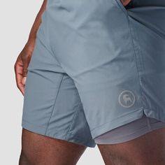 Made with a movement-friendly stretch and moisture-wicking polyester, our Backcountry Destination 7in Lined Short delivers warm weather comfort whether we're breaking a sweat on the trail or resting at home. Plus, the secure pocket space and an adjustable waist drawcord add on-the-go functionality and laid-back style. Outdoor Athletic Shorts With Moisture-wicking Stretch, Outdoor Stretch Athletic Shorts With Moisture-wicking, Outdoor Moisture-wicking Stretch Athletic Shorts, Moisture-wicking Stretch Athletic Shorts For Outdoor, Gray Breathable Athletic Shorts For Training, Breathable Gray Athletic Shorts For Training, Gray Moisture-wicking Athletic Shorts For Sports, Gray Go-dry Functional Athletic Shorts, Breathable Midweight Activewear For Gym