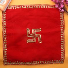 Swastik Red Velvet Puja Aasan (38 x 38 Cms) Set of 4 This set of 4 Swastik Red Velvet Puja Aasans features an elegant red velvet design with Swastik symbols, perfect for traditional Pooja ceremonies and religious events. Features: Elegant red velvet design Swastik symbols Set of 4 pieces Ideal for traditional Pooja Specifications: Dimensions: 38 x 38 Cms Color: Red Design: Swastik Quantity: Set of 4 Material & Care: Crafted from red velvet. For best care, gentle hand wash or dry clean is recommended. Legal Disclaimer: The product is guaranteed to be 100% genuine. Product images are for illustrative purposes only. Images/packaging/labels may vary from time to time due to changes made by the manufacturer's manufacturing batch and location. The product description is for information purposes Red Cutdana Sets For Puja, Festive Zari Work Sets For Gifts, Red Traditional Wear For Puja Navratri, Red Set With Zari Work For Puja, Red Traditional Wear For Navratri Puja, Red Sets With Zari Work For Puja, Motif Sets For Festivals And Gifts, Festive Motif Sets For Gifts, Red Traditional Wear For Festivals