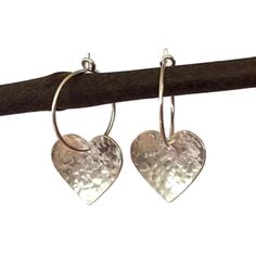 "Simple yet stylish sterling silver hoop earrings featuring a beautiful hand hammered heart. They will add a lovely touch to any outfit  and will make an ideal valentines or anniversary gift. Total length: approximately 2.5 cm (0.9\") Heart: 1.5 cm (0.5\") x 1.3 cm (0.5\") Hoop size: 1.5 cm (0.5\") in diameter x 0.7mm thick. The earrings will come in a beautiful gift box." Small Hoop Nickel-free Heart Earrings For Anniversary, Nickel-free Small Hoop Heart Earrings For Anniversary, Nickel Free Small Hoop Heart Earrings For Anniversary, Silver Small Hoop Heart Earrings As Gift, Silver Small Hoop Heart Earrings For Gift, Silver Small Hoop Heart Earrings For Anniversary, Gift Sterling Silver Small Hoop Heart Earrings, Small Hoop Sterling Silver Heart Earrings, Heart-shaped Hammered Sterling Silver Jewelry