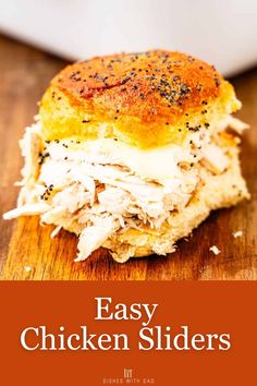 an easy chicken slider on a cutting board with text overlay that says easy chicken sliders