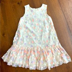 Great Dress With Sparkly Hearts And Tulle Top Layer, Gathered In The Bottom To A Single Ruffle. Never Used In Brand New Condition. Size 5-6. White Sleeveless Dress With Heart Print, Sleeveless Heart Print Dresses For Spring, Heart Print Sleeveless Dress For Spring, Spring Heart Print Sleeveless Dress, Sleeveless Heart Print Spring Dress, White Ruffled Dresses By H&m, Playful Fitted Heart Print Dress, Playful Fitted Dress With Heart Print, White Ruffled H&m Dresses