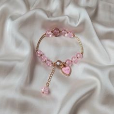 Don't miss out on this beautiful pink heart charm bracelet. It works with a large variety of looks and add a bit of sparkle to your outfit. MORE jewellery pieces avaliable on our shop! Any questions please message we are happy to help. Free postage in UK Thank you for shopping with us Heather&Bumble 📪Follow us at: Instagram: heatherandbumble Twitter: Heather_Bumble Pintrest: Heather & Bumble Pink Heart Bead Charm Bracelet - Bead Jewellery, Pink Accessories, Charm Bracelet,Bead Bracelet,Classy Bracelet,Cute Bracelet,Pink Jewelley Aesthetic Pink Bracelet, Bracelet Cute, Pink Charm, Cute Bracelet, Best Friend Necklaces, Bead Charms Diy, Bracelet Bead, Orange Earrings, Pink Accessories