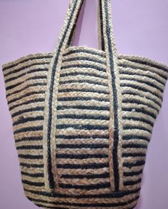 These bags are eco-friendly and made from 100% natural jute. These bags are made for your long walks to ensure your travel comfort and give you elegant beach style. It adds casual charm to your daily personality. The straps are made fine and strong so you can easily carry it on your shoulder and keep your hands free. Hence a very convenient type of bag. Item: handmade braided Size: 30 x 30 x 30 cm Type: shoulder bag/ cross for bag Material: jute and cotton Production area: Panipat India Delivery Luxury Jute Crochet Bag For Shopping, Bohemian Burlap Bag In Natural Color, Natural Woven Burlap Bags, Natural Burlap Woven Bags, Natural Burlap Handwoven Bag, Handwoven Burlap Bag In Natural Color, Handwoven Burlap Bags In Natural Color, Eco-friendly Jute Shoulder Bag For Daily Use, Eco-friendly Jute Shoulder Bag With Braided Handles