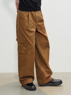 Composition : COTTON 100%Country of Origin : CHINA Brown Pants With Belt Loops And Loose Fit, Baggy High-waist Work Pants For Streetwear, Brown Baggy Cargo Pants For Fall, Full Length Brown Cargo Pants, Baggy Brown Straight Leg Pants, Brown Fall Bottoms For Streetwear, Casual Brown Jeans With Hip Pockets, Baggy Brown Tapered Leg Bottoms, Baggy Brown Bottoms With Tapered Leg