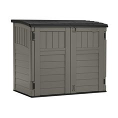 an outdoor storage shed with the door open and black roof on it's side