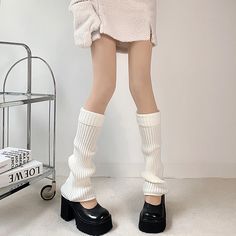 This price is for a pair of leg warmers only. Fitted White Knee-high Socks For Winter, Trendy Mid-calf Bottoms For Winter, Trendy Mid-calf Winter Bottoms, Cozy Knee-high Legwear For Winter, Cozy Knee-high Winter Legwear, Thigh-high Knitted Legwear For Fall, Casual Thigh-high Knitted Legwear, Knitted Knee-high Legwear For Fall, Solid Footless Winter Legwear