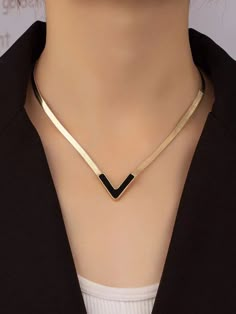 All In Black Necklace is an ideal choice for the fashionista who wants to make a bold statement. Its classic black design makes it both timeless and stylish, sure to complement any outfit. It's perfect for adding just the right amount of flair to your ensemble. Length 16.1"-18.9" Due to monitor differences, actual colors and/or patterns may vary slightly from online. Luxury Minimalist Snake Chain Necklace For Formal Occasions, Luxury Modern Dangle Necklaces, Luxury Black Lariat Necklace Gift, Luxury Formal Clavicle Chain Necklace, Elegant Black Luxury Lariat Necklace, Luxury Black Long Necklace, Luxury Elegant Office Jewelry, Modern Luxury Office Jewelry, Vee Line Necklace