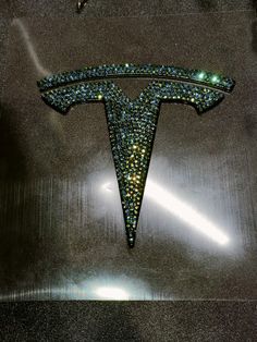 the letter t is made up of many small crystals