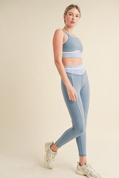 Stay cool and comfortable during your workout with our Color Contrast Tank Top & Leggings Set. The high neck tank features a racerback design for added support, while the high rise leggings offer four way stretch and moisture wicking technology for ease of movement. Lightweight and breathable, this set will support you through any exercise routine. InseamS - 26"M - 26.25"L - 26.5"Model InfoHeight: 5'10" Bust: 32"Waist: 25"Hips: 35.5" Model is wearing size S. Light Support Athleisure Activewear, Affordable High-waisted Spring Activewear, Cheap Mid-rise Spring Activewear, Affordable Mid-rise Sports Activewear, Affordable Sporty Leisure Activewear, Workout Leggings Outfit Casual, Thigh High Boots With Skirt, Leggings Outfit Casual, Beachy Outfits