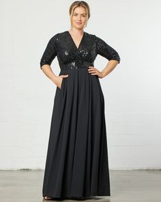 You’ll look perfectlypolished and elegant in our Paris Pleated Sequin Gown. Designed with a stunningsequin bodice and a pleated A-line skirt with pockets, you’ll look like theguest of honor wherever you go. Made exclusively in women’s plus sizes.Please Note: View the Shipping & Returns tab for our Sharktag Policy. Long Dress With Sleeves, Best Dressed Wedding Guest, Jumpsuit And Cardigan, Plus Size Sequin, Elegant Plus Size, Chic Cardigan, Evening Gown Dresses, Sequin Gown, Black Tie Wedding