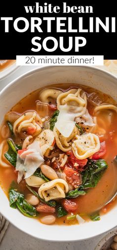 white bean tortellini soup in a bowl with spinach and tomatoes