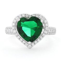 Band width: 3.4mm

Shank width: 2mm



Stone material: green & clear cubic zirconia

Center stone size: 10mm

Stone shape: heart shape (center) & round

Center stone carat weight: 3.2 ct.

Total number of CZ stones: 52

Stone setting: Prong setting



Metal: 925 sterling silver

Plating: rhodium plated

Finish: high polish Green Heart Ring For Anniversary, Green Diamond Heart Cut Ring, Green Heart-shaped Emerald Ring For Anniversary, Green Heart-shaped Ring For May Birthstone, Green Heart Ring For Wedding And May Birthstone, Green Heart Ring For May Birthstone Wedding, Green Heart Ring For Wedding, May Birthstone, Green Heart Ring For Wedding With May Birthstone, Green Heart Cut Wedding Rings