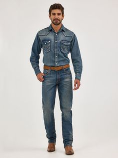 OUR WESTERN ROOTS MADE MODERN Wrangler® Retro® slim fit jeans nod to our history while introducing fits and washes suited for the modern cowboy. Designed with a closer fit and leg opening that still falls comfortably over boots, our men's Wrangler® straight leg slim fit jeans add extra style to the classic look you love. These jeans sit low on the waist and make it easy to show off your favorite belt buckle. That design detail is our Western heritage showing through, something that happens often Denim Jeans With Pockets For Ranch, Rugged Fitted Denim Blue Bottoms, Fitted Rugged Denim Blue Bottoms, Fitted Dark Wash Western Jeans, Fitted Western Dark Wash Jeans, Fitted Western Style Dark Wash Jeans, Fitted Rugged Rigid Denim Bottoms, Dark Wash Jeans With Five Pockets For Ranch, Fitted Dark Wash Jeans For Ranch