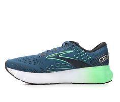 a blue and green running shoe on a white background