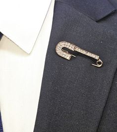 Here at TieTownCo, we make sure our formal wear accessories complement your formal wear of choice!  Presenting our luxury brooch pin collection. Stand out  and steal the spotlight as you sport gold and silver plated alloys fashioned into a whimsical motif.  Sharp, playful and luxurious--our brooch pins add that dash of dapper to any ensemble.  Perfect as gifts too! Silver Elegant Enamel Pin For Formal Use, Silver Elegant Enamel Pin For Formal Events, Luxury Gold Enamel Pin For Formal Occasions, Elegant Silver Enamel Pin For Formal Occasions, Elegant Formal Enamel Pin Brooch, Elegant Gold Enamel Pin For Party, Formal Safety Pin Brooch Jewelry, Formal Safety Pin Brooch, Elegant Safety Pin Brooch