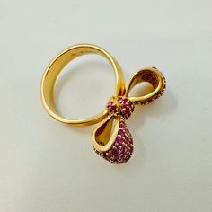 Mimi So 18K Rose Gold Bow Ring with Pink Sapphires (est. retail: $6,800) Designer = Mimi So Size = 6.5 Material = 18K Gold Gemstone = Sapphire Condition = Very Good Class = Premier Location: Glencoe Item Number: 4003-55 Item ID: 271825 Category: Ring Bow Ring, Pink Sapphire, 18k Rose Gold, Item Number, 18k Gold, Sapphire, Rose Gold, Size 6, Gemstones