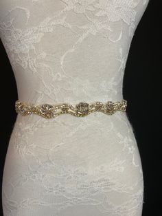 Wedding Belt, Bridal Belt, Sash Belt, Crystal Pearl Rhinestone, Cream Ribbon, Gold Base Rhinestones, Ivory ribbon Absolutely Dazzling Finest Crystal Rhinestone.  This belt will take your breath away!  ** Total sash belt is measuring 2.5 yards long (88 inches). Gold Embellished Wedding Sash, Gold Embellished Sashes For Wedding, Gold Embellished Bridal Accessories For Wedding, Elegant Bedazzled Wedding Sash, Bedazzled Crystal Bridal Belt For Wedding, Bedazzled White Bridal Belt For Wedding, Crystal Bedazzled Bridal Belt For Wedding, White Crystal Wedding Sash, Fitted Gold Sash For Wedding